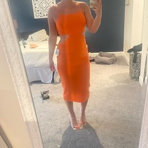 Orange knit cut out dress Size Large won once